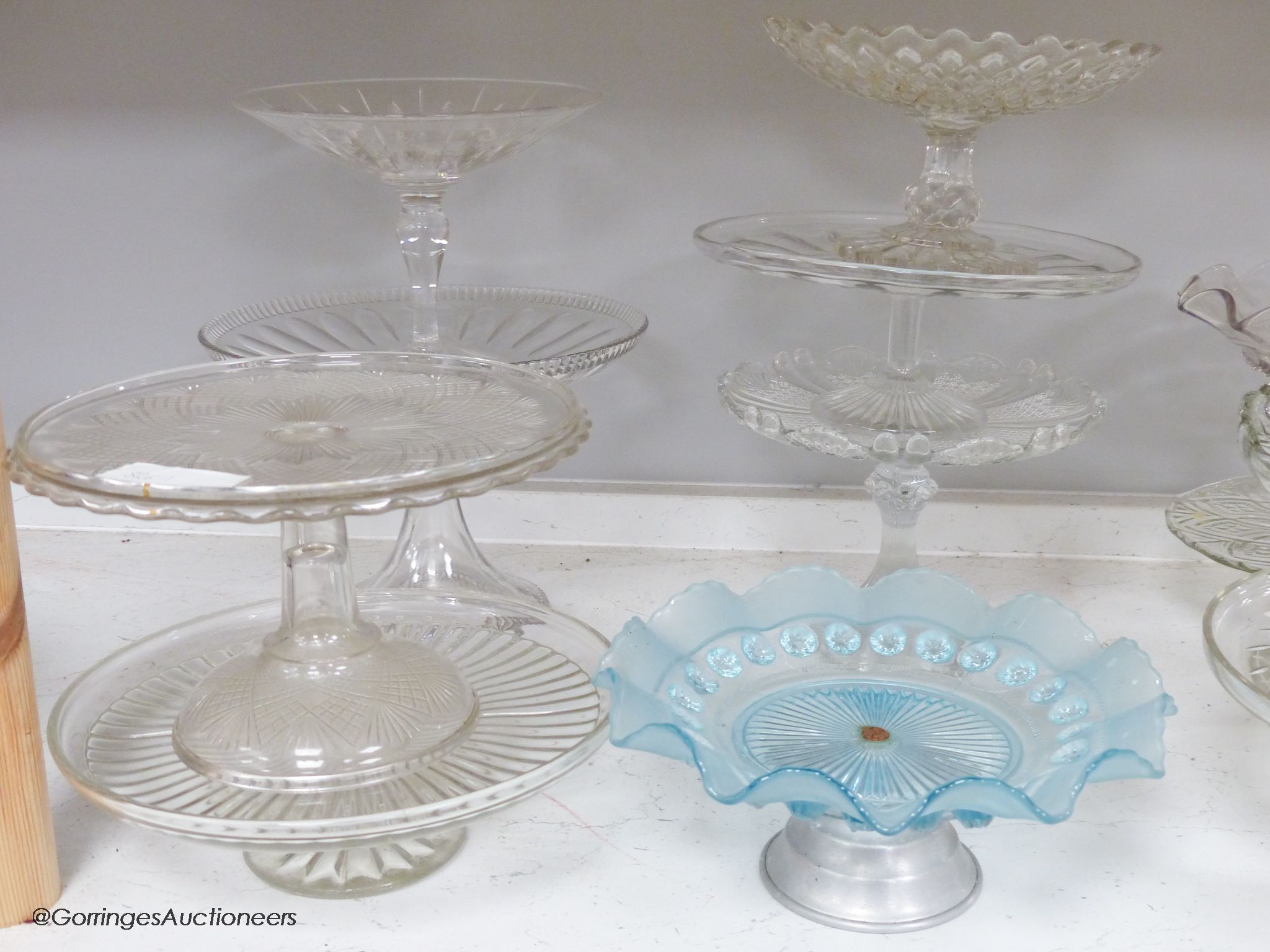 Twelve various glass cake stands